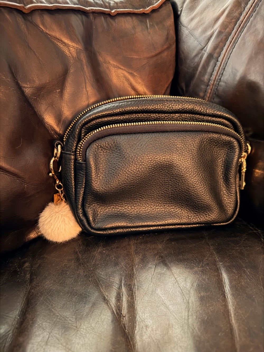 Black Pebbled Crossbody Bag with Pom Charm